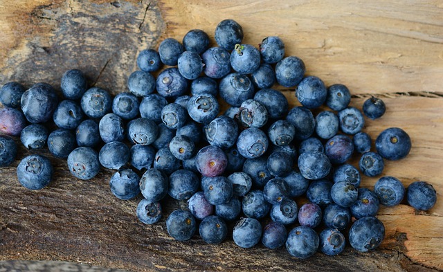 Blueberries on a wooden surface
