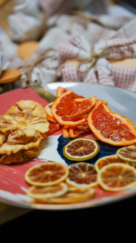 Assorted dehydrated fruit slices on a plate