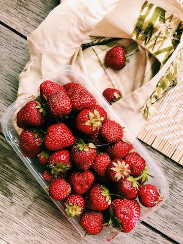 Strawberries inside a plastic pack