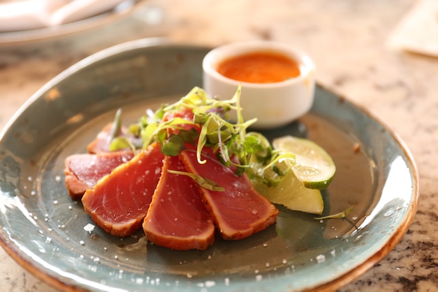 Slices of tuna on a ceramic plate