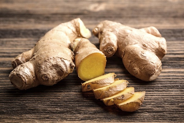 Fresh ginger root on  a wooden surface