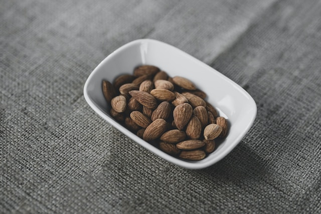 Almonds in a rectangular ceramic bowl