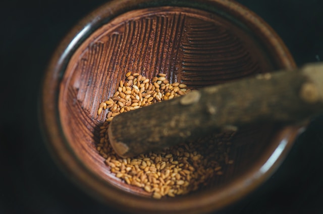Seasame seeds inside a mortar and pestle