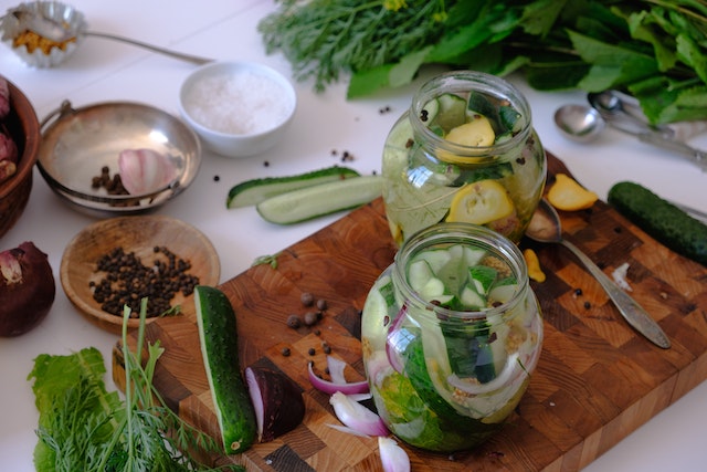 Jars filled with pickled cucumbers