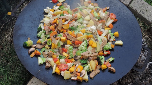 Vegetables cooking on a griddle